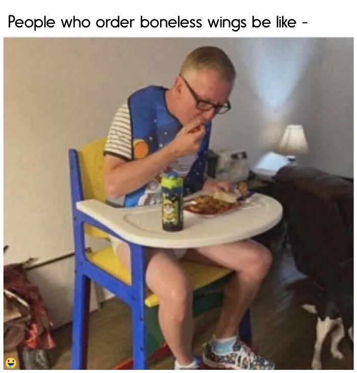 Person humorously eating in a high chair, resembling a food meme about boneless wings.