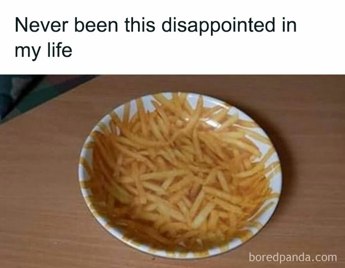 Plate of painted fries creating a food meme disappointment illusion.