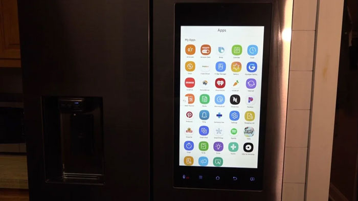 Smart fridge with a touchscreen displaying apps, related to crazy Florida Man stories.