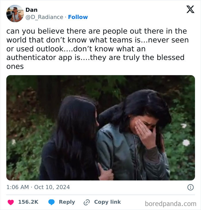 Two women, one comforting the other who is laughing, outdoors. Screenshot of a tweet about work ignorance humor.