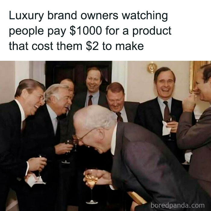 Executives laughing, illustrating a 'sadcastic' meme about luxury brand pricing strategies.