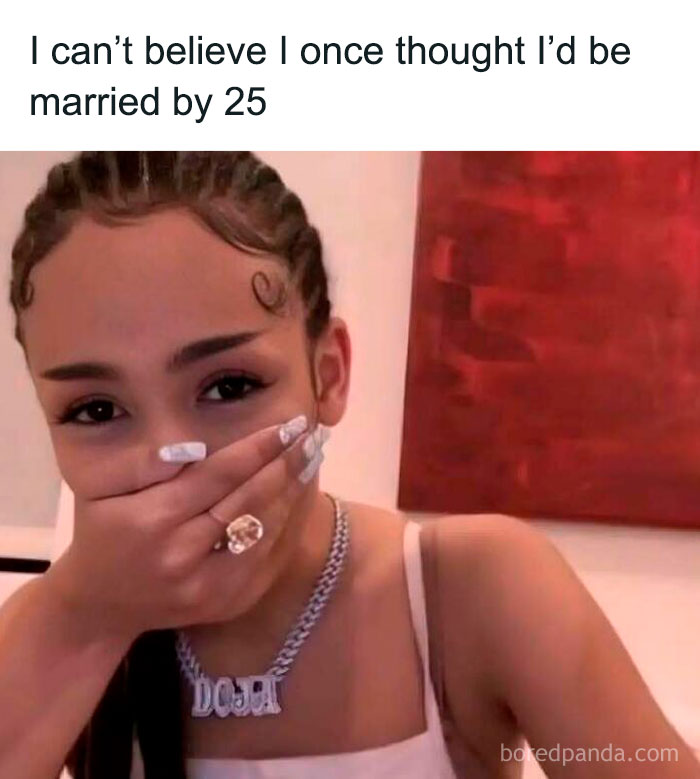 Young woman with braided hair, necklace covers mouth in 'sadcastic' meme about marrying by 25.