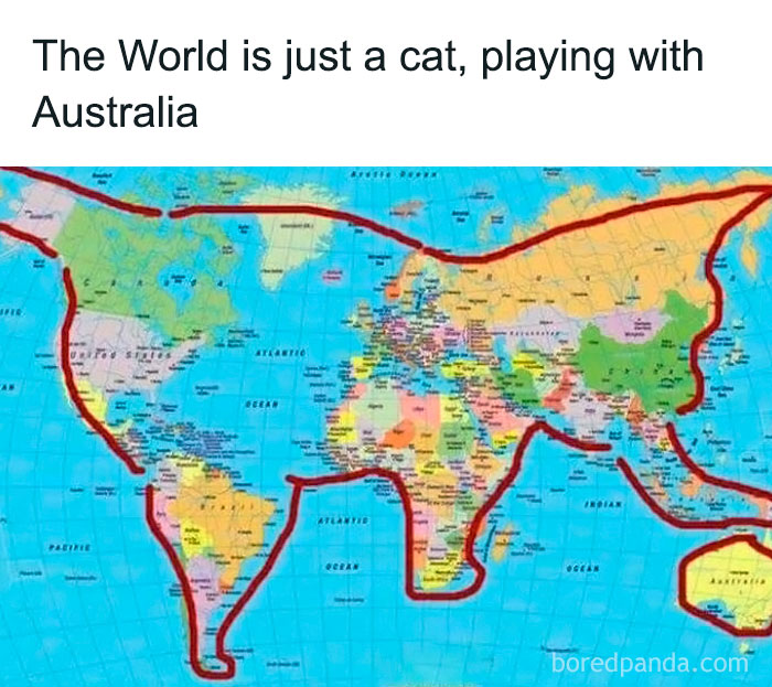 Sadcastic meme with continents outlined as a cat playing with Australia on a world map.