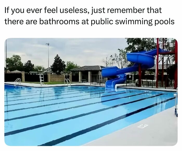 Sarcasm meme showing a public swimming pool with a blue slide, highlighting the irony of pool bathrooms.