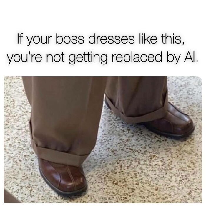 Close-up of feet in brown shoes and baggy pants with a sarcastic caption about bosses and AI.