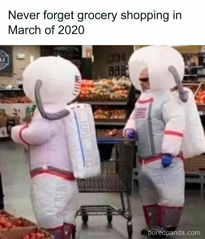 Two people in astronaut suits grocery shopping, representing sarcasm from March 2020 pandemic.