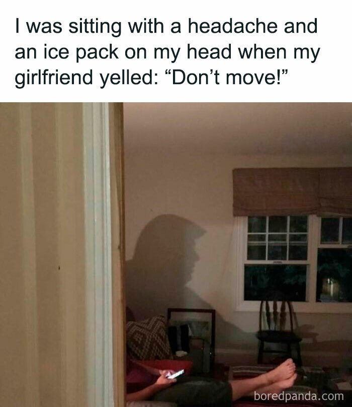 A person sitting with an ice pack on their head, casting a shadow resembling a famous hairstyle; a sarcastic meme moment.