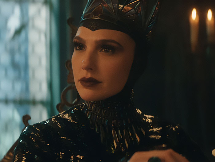 Character in regal attire at the "Snow White" event, highlighting the tiny birthday party theme.