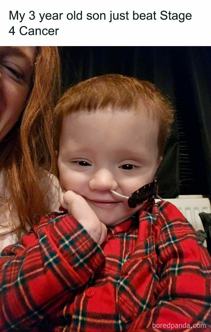 Smiling toddler in plaid shirt after overcoming stage 4 cancer, sharing a positive and uplifting moment.