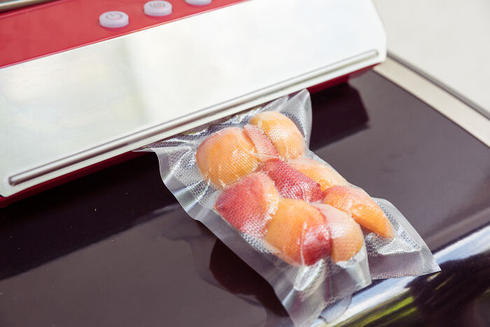 Vacuum sealer preserving peaches, an impactful buy under $500, highlighting life-enhancing purchases like CPAP.
