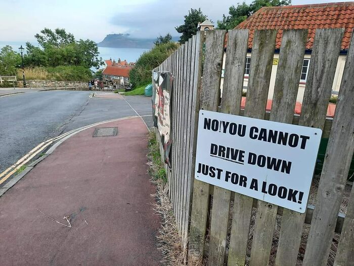 Sign warning against driving down road, highlighting the aftermath of someone's big mistake.