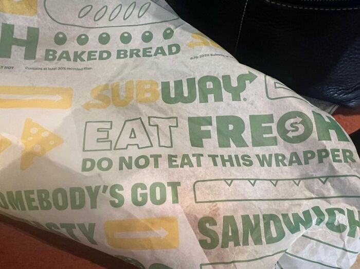 Subway sandwich wrapper with text warning not to eat the wrapper, referencing a potential aftermath of a mistake.
