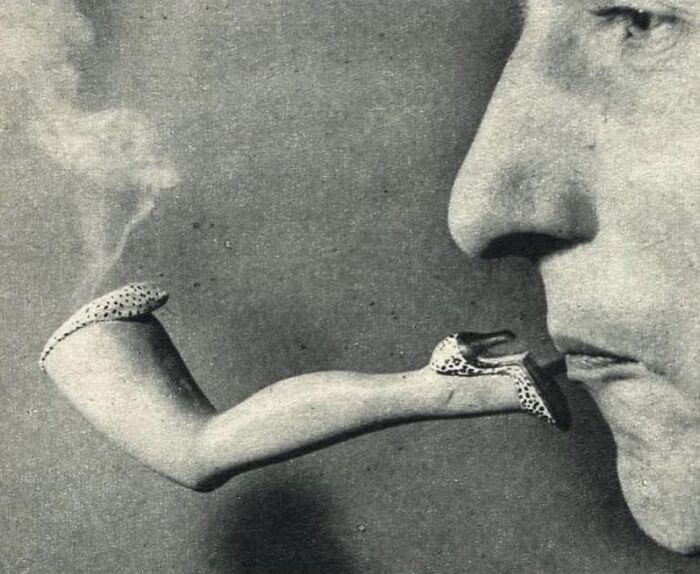Surreal historical image of a person smoking a pipe shaped like a leg, capturing forgotten corners of history.