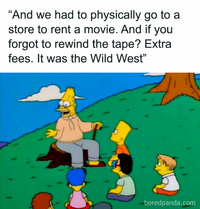 Grandpa Simpsons recounts funny throwbacks about renting movies on tape to kids sitting on grass.
