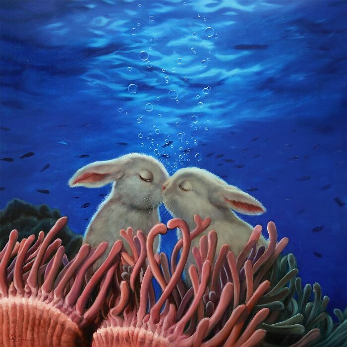 Two bunnies kiss underwater in a charming animal painting by Lucia Heffernan.