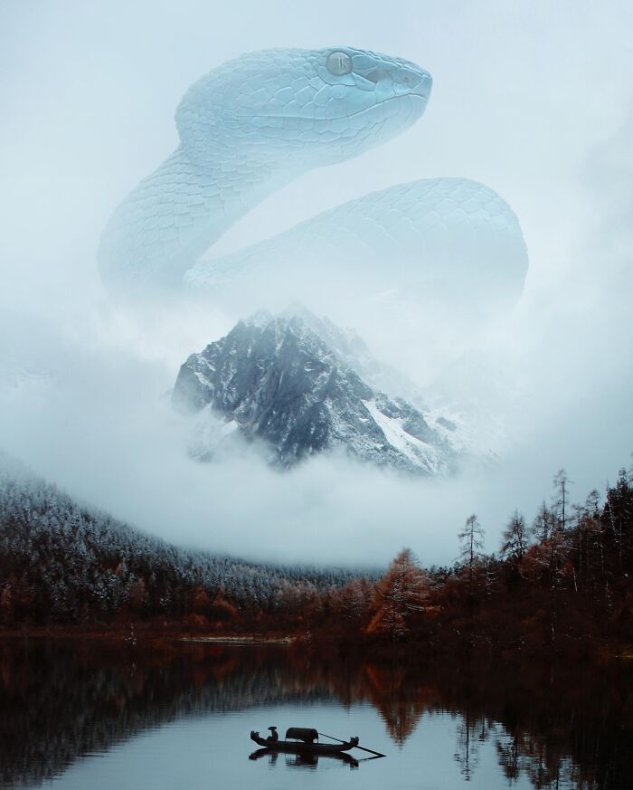 Fantasy scene with a giant translucent snake above snowy mountains, reflecting in a serene lake.