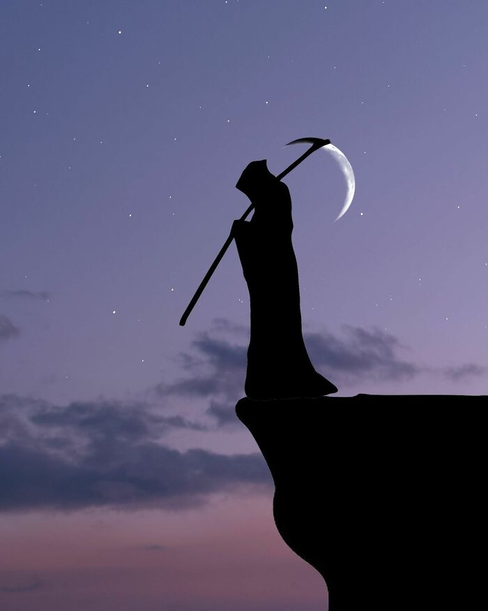 Silhouette of a figure with a scythe against a twilight sky, showcasing silhouette photography.