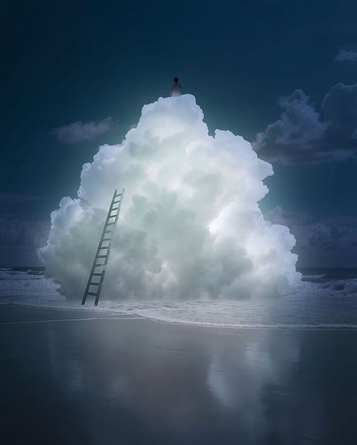 Ladder leading to cloud on ocean shore in surreal digital artwork blending fantasy with reality.