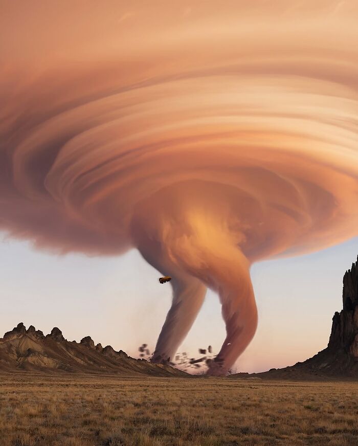Surreal digital artwork depicting a massive tornado blending fantasy elements in a desert landscape.