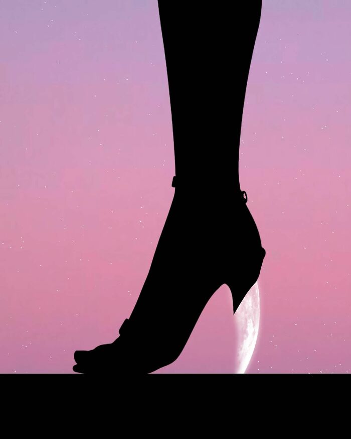 Silhouette of a high-heeled shoe stepping on a crescent moon, pink sky in background. Silhouette photography concept.