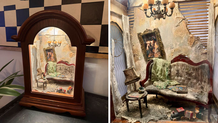 Mirror reflecting a creepy handmade craft in an ornate room, showcasing eerie vintage decor and furniture.