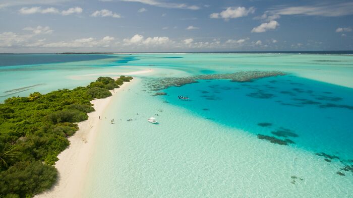 Stunning beach with turquoise waters and white sand, perfect for a tropical getaway.