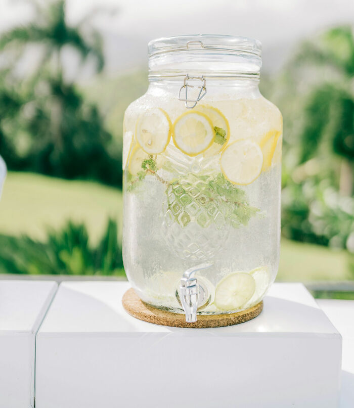 Lemon water jar at a wedding, potential red flag for guests expecting refreshments.