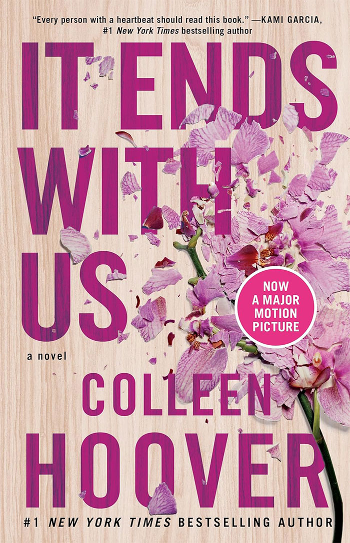 Cover of &ldquo;It Ends with Us&rdquo; by Colleen Hoover, featuring pink flowers, related to books people judge.