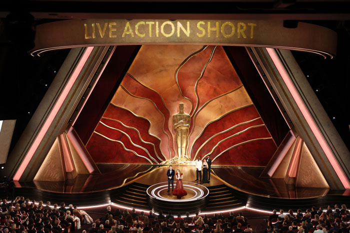 Oscars 2025 Live Action Short award stage with audience watching the ceremony.