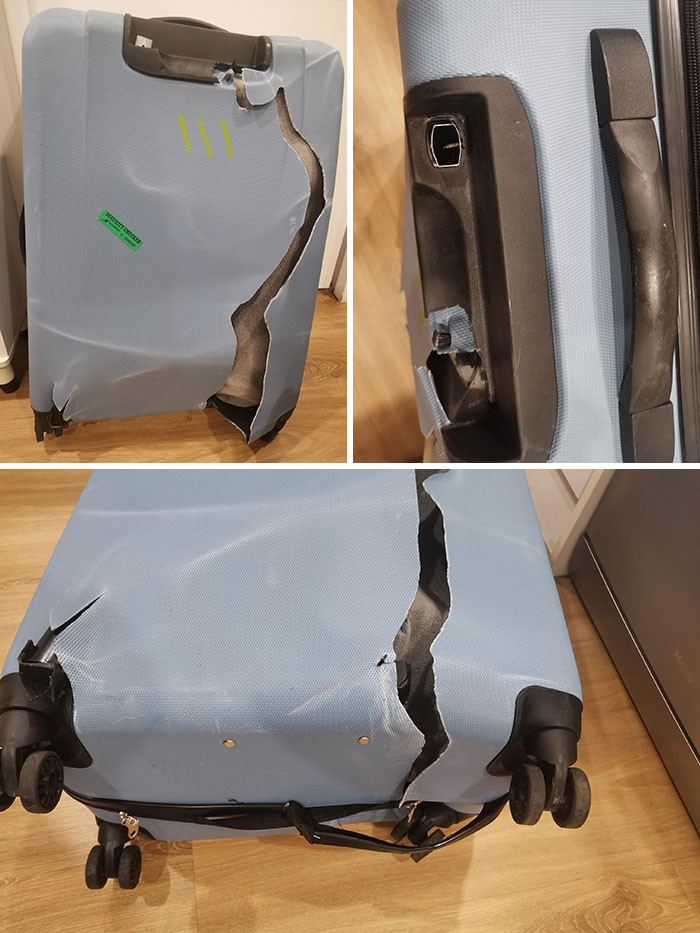 Damaged suitcase with ripped fabric and broken handle, highlighting an epic airline baggage fail.
