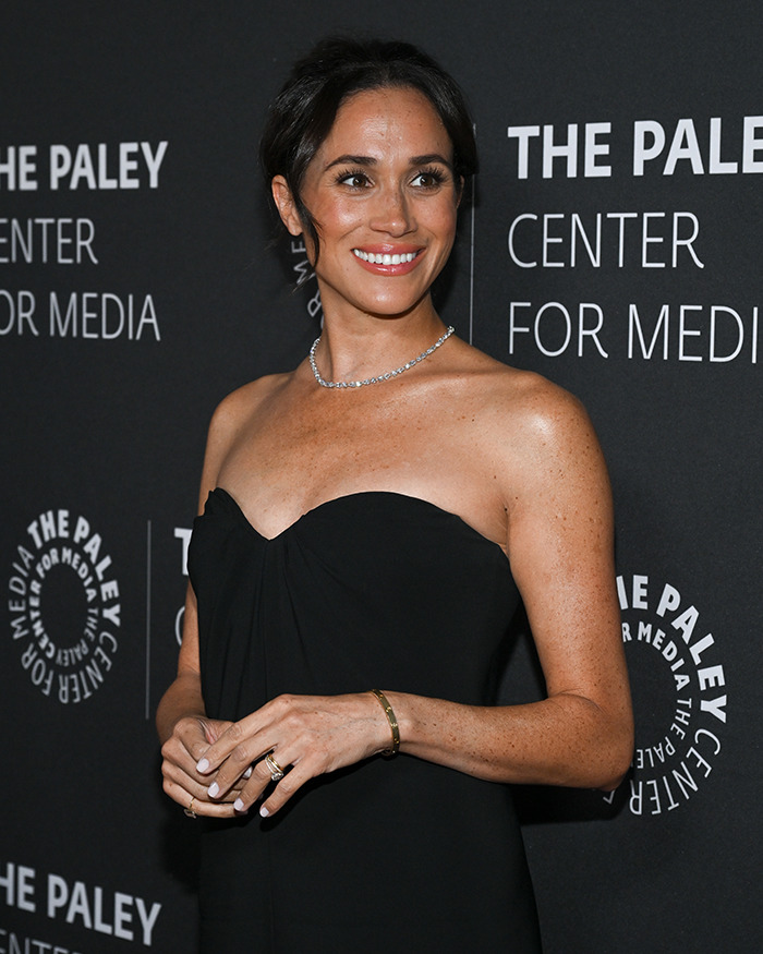 Meghan Markle in a black dress at The Paley Center event. Meghan Markle in a black dress at The Paley Center event.
