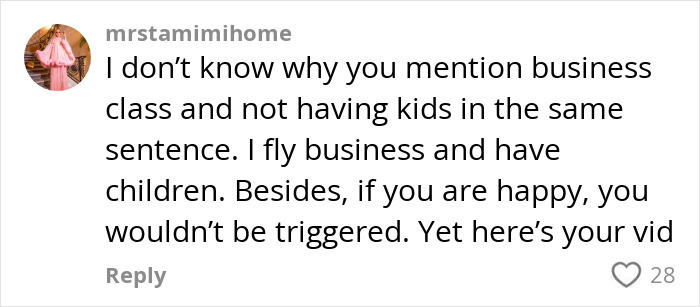 Comment discussing business class, child-free life, and personal happiness.