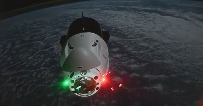 SpaceX crew capsule approaching the ISS over Earth, set to return stranded NASA astronauts home safely.