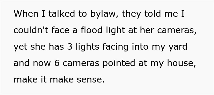 Text describing encounter with neighbor's cameras pointed at windows. Text describing encounter with neighbor's cameras pointed at windows.