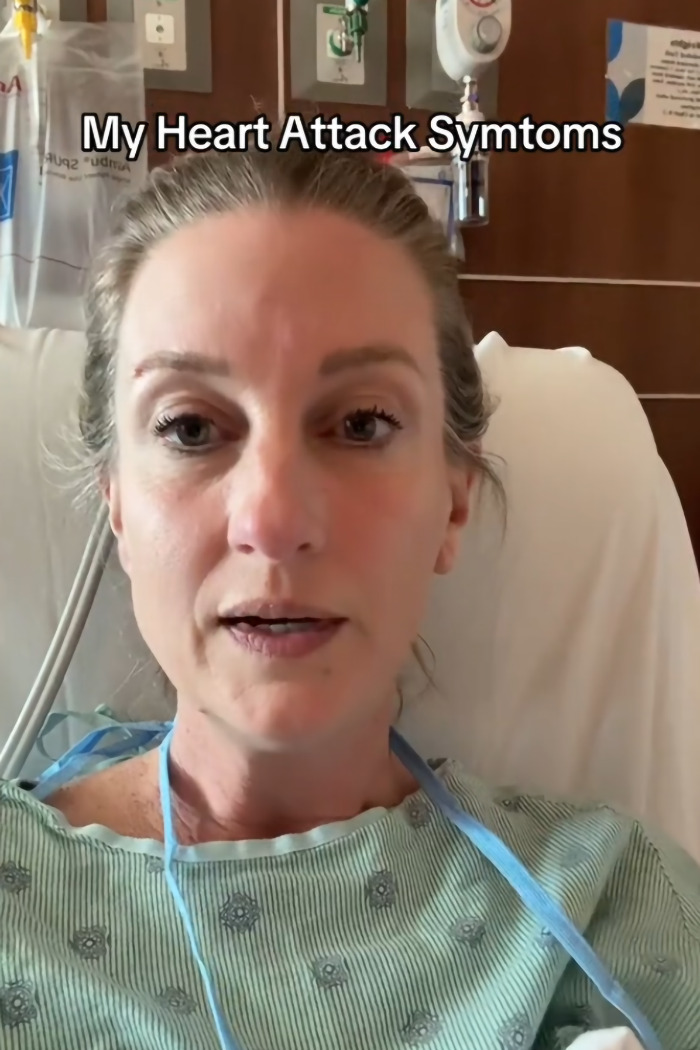 46YO woman in hospital bed discussing subtle heart attack symptoms, sharing her personal experience.