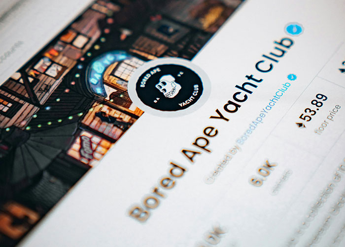 Bored Ape Yacht Club page displaying details and an illustration, similar to online mom groups in exclusivity.