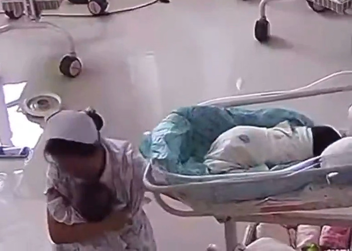 Nurse protects newborns during Myanmar earthquake, demonstrating bravery and care.