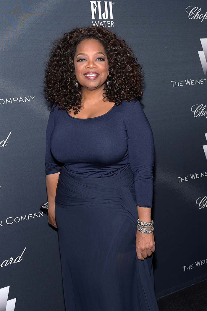 Person in a navy dress at a Hollywood event, highlighting debates on Ozempic and beauty standards. Person in a navy dress at a Hollywood event, highlighting debates on Ozempic and beauty standards.