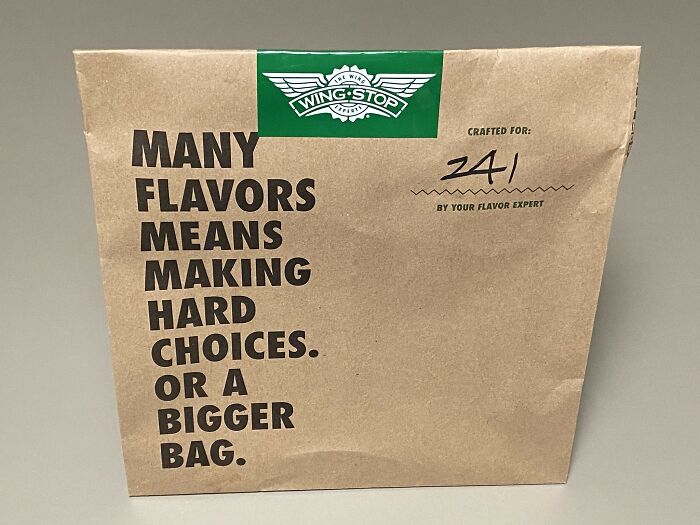 Wingstop bag with slogan on flavors, highlighting fast food choices.