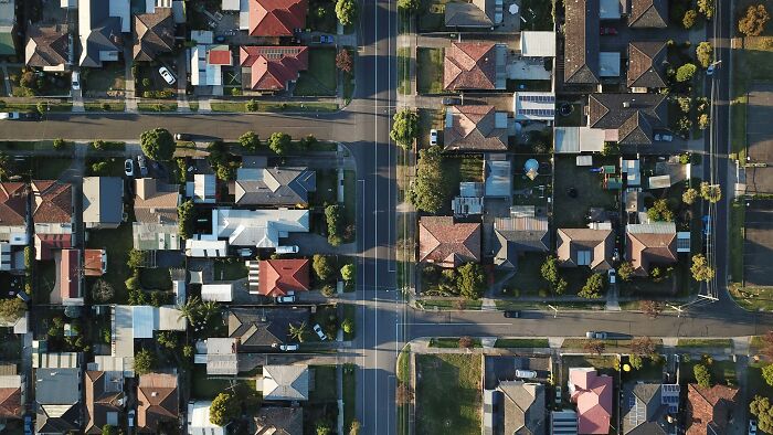 Aerial view of a suburban neighborhood, relevant to first-time home buyers.