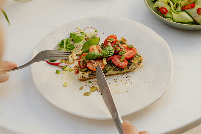 Healthy meal being enjoyed, showcasing vibrant vegetables and herbs, emphasizing what older generations got right in food.