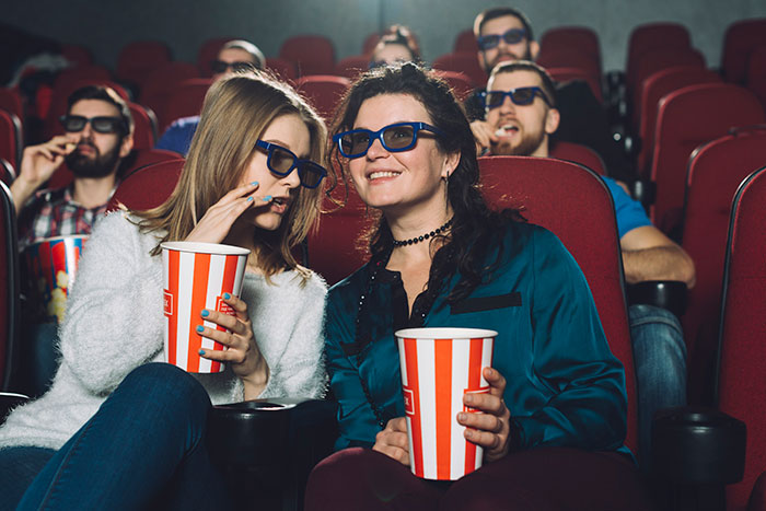 People in 3D glasses enjoying a movie, highlighting things older generations got right.
