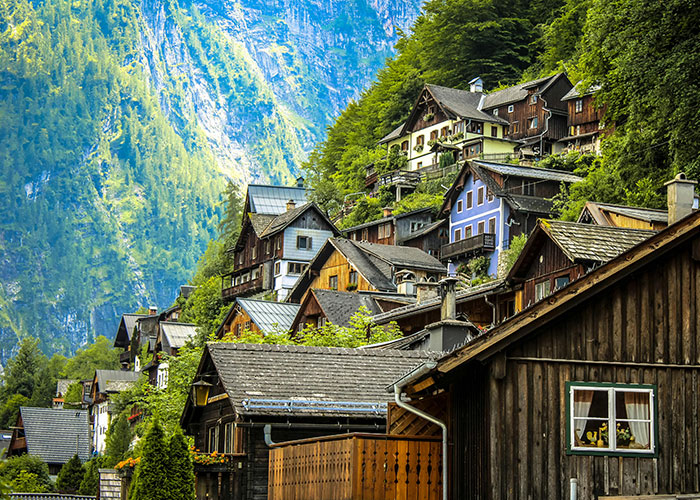 Charming hillside village with colorful houses, representing a picturesque country setting.