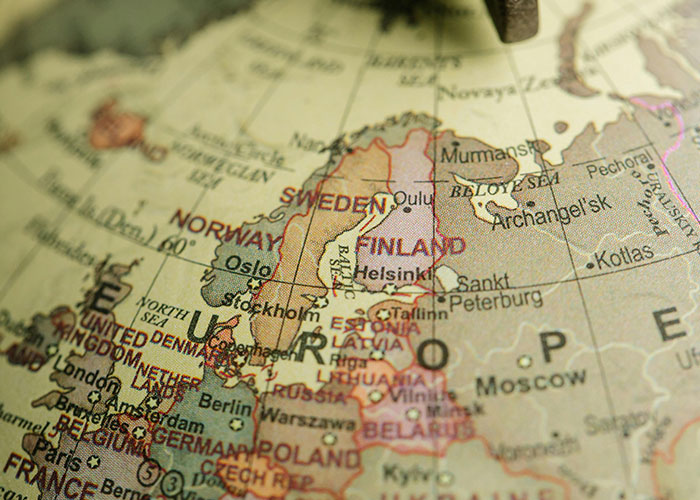 Close-up of a globe showing European countries like Sweden, Norway, and Finland.