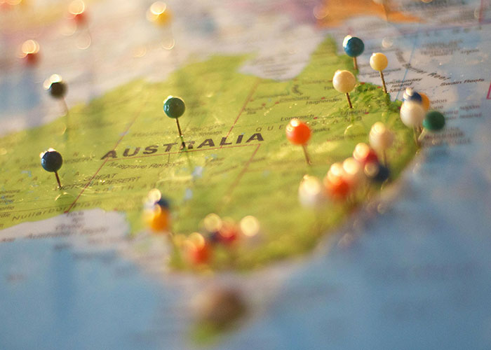 Map of Australia with colorful pins marking locations, related to countries people make fun of.