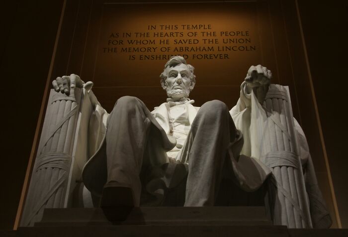 Statue of Abraham Lincoln seated at the Lincoln Memorial, symbolizing leadership and history expertise. Statue of Abraham Lincoln seated at the Lincoln Memorial, symbolizing leadership and history expertise.