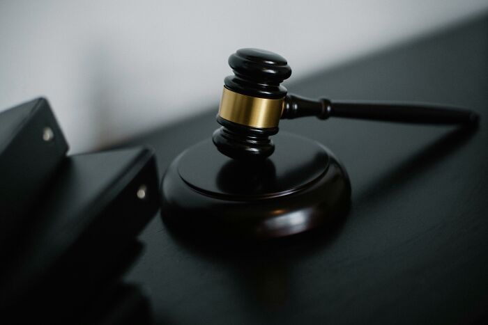 A judge's gavel on a desk, symbolizing quirky legal rules.