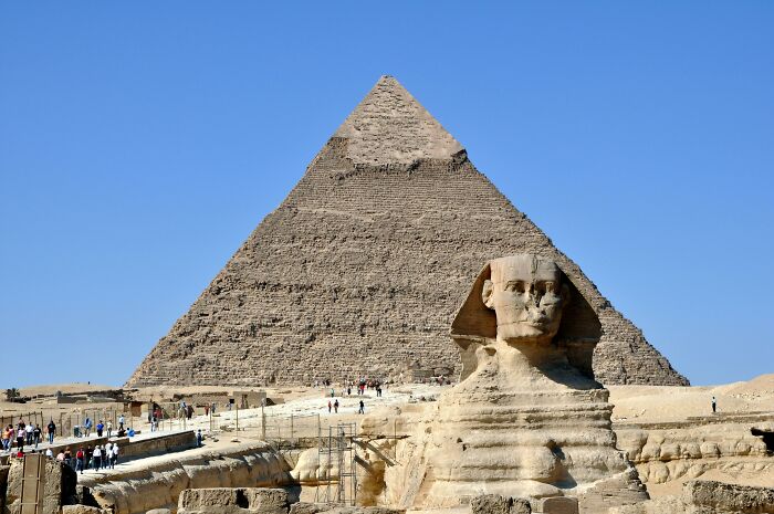 Sphinx and Great Pyramid in Giza, a touristy place often deemed overrated by seasoned travelers.