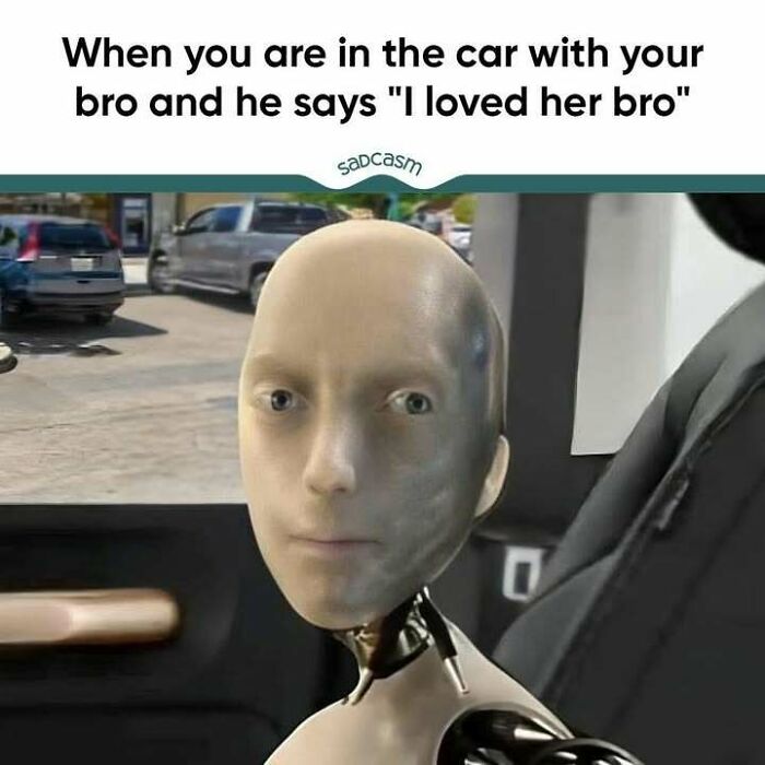 AI robot with a sad expression in a car, representing a 'sadcastic' meme moment.