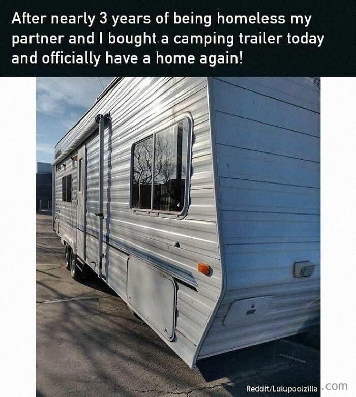Camping trailer parked, symbolizing a positive and uplifting new beginning after overcoming homelessness.